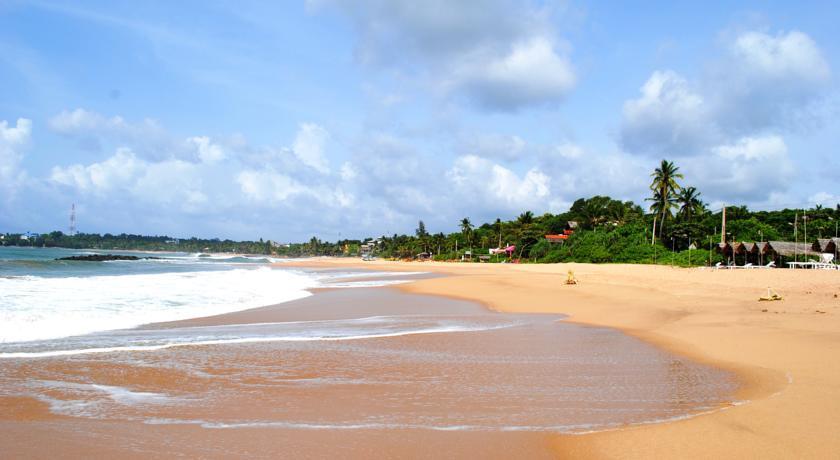 Hotel Peacock Land à Tangalle Extérieur photo